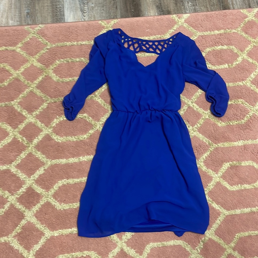 Dress size S ( has a tie bow in the back )